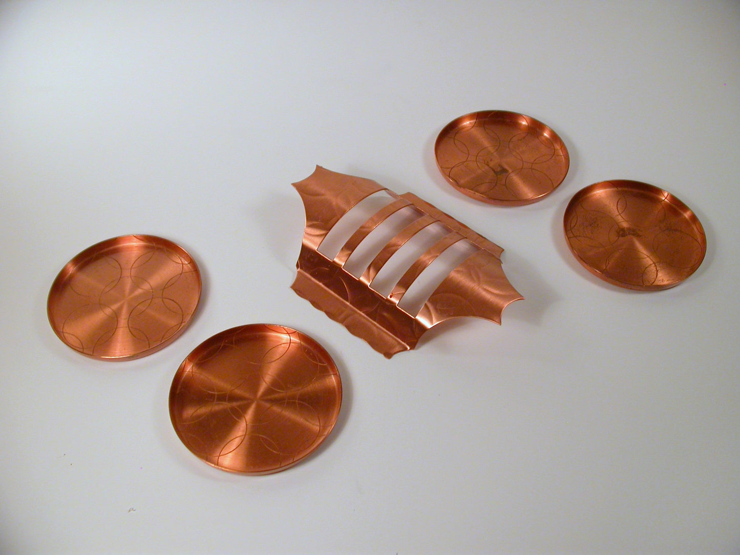 Mid Century copper coaster set, made by Fantasy Copperware.
