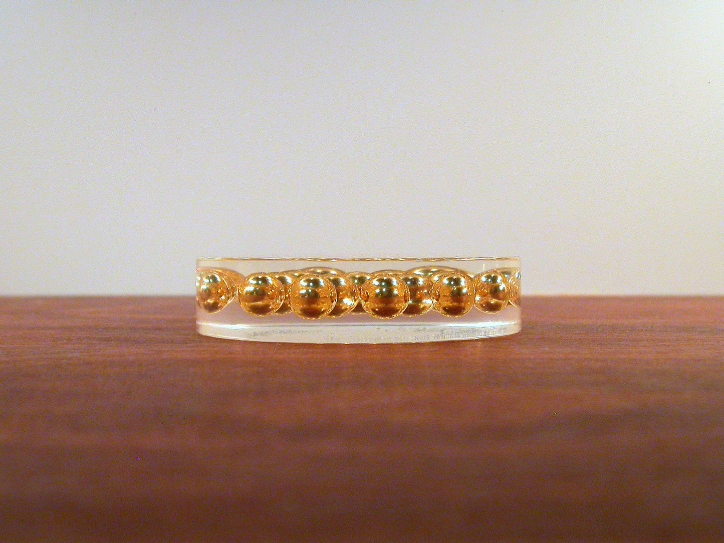 Acrylic Paperweight | Suspended Gold Spheres