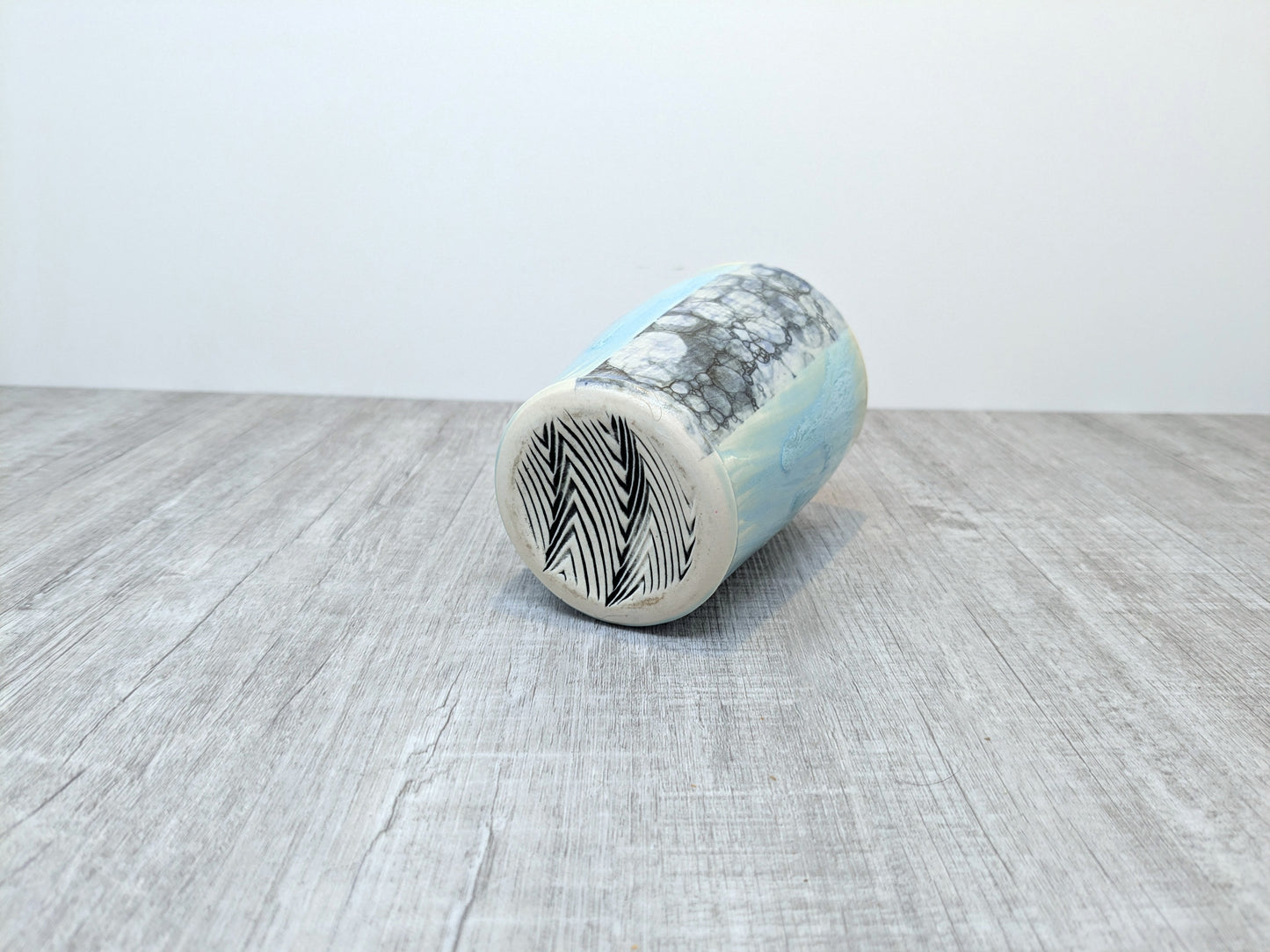 Blue Drip Glaze Pottery Mug with Abstract Pebble Design