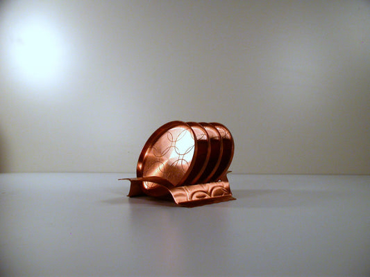 Mid Century copper coaster set, made by Fantasy Copperware.