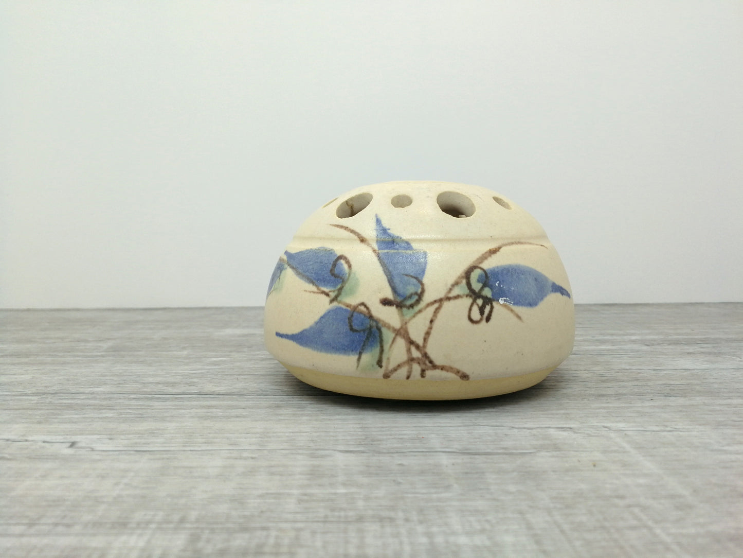 Nora Lewin studio pottery flower frog vase | Round Mushroom Cap Vase with Blue Abstract Design