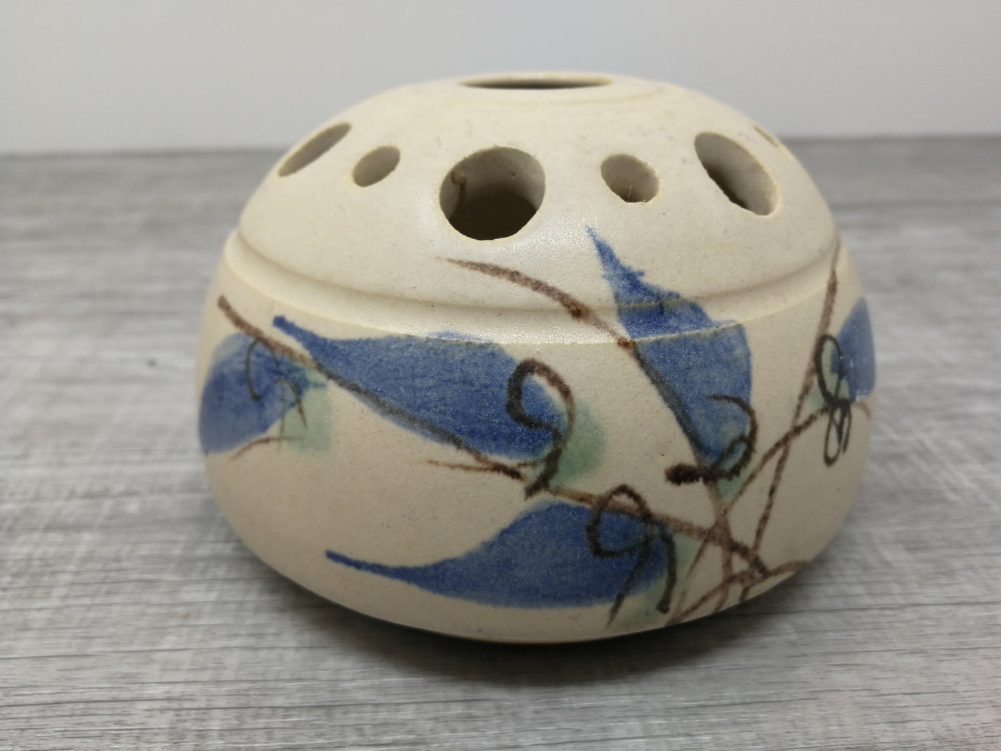 Nora Lewin studio pottery flower frog vase | Round Mushroom Cap Vase with Blue Abstract Design
