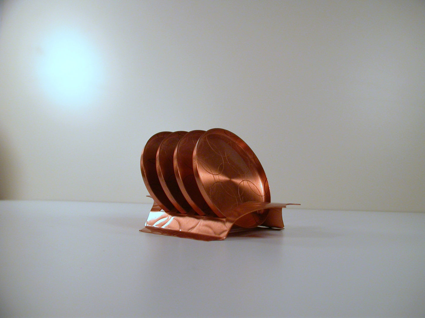 Mid Century copper coaster set, made by Fantasy Copperware.